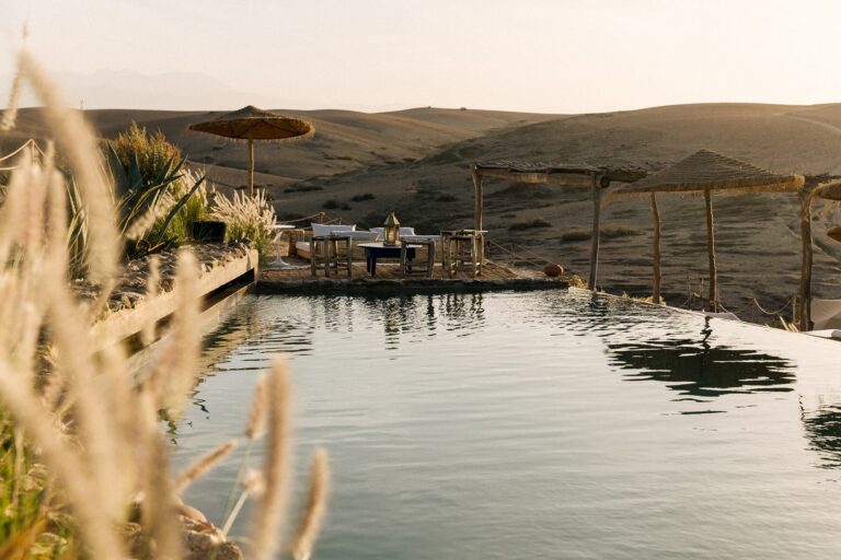 the sunset pool at Caravan Agafay by Our Habitas